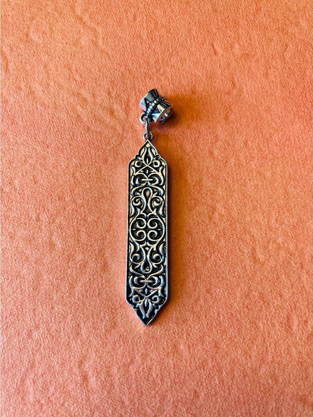 Intricate Silver-Tone Pendant